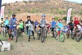 Old and young riders at start of fun Mountain Bike Race Royalty Free Stock Photo